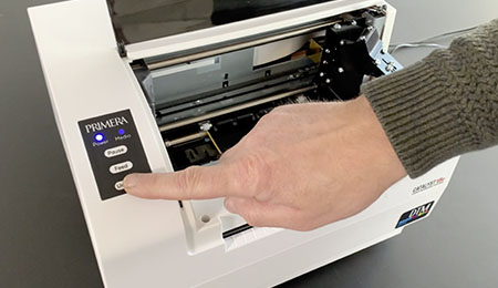 Unload and remove the label roll from the Catalyst Label Laser Marking System