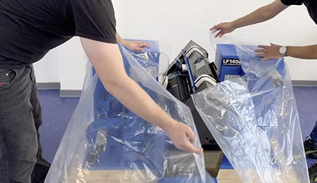 Wrap the Label Finishing System into Foil.