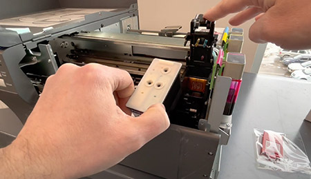Close cover and secure the LX3000e Printer with tape
