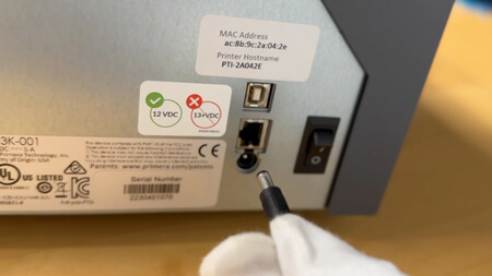 Turn the printer off and remove the cables.